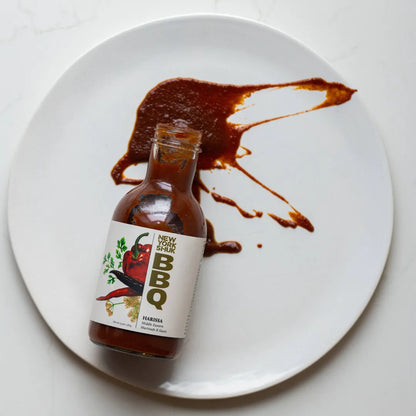 New York Shuk Harissa BBQ sauce splashed on a plate