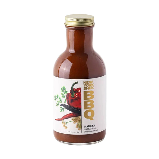 Bottle of New York Style BBQ Harissa sauce on a white background
