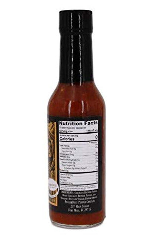 Bottle of puckerbutt chocolate plague hot sauce with nutrition label on a white background