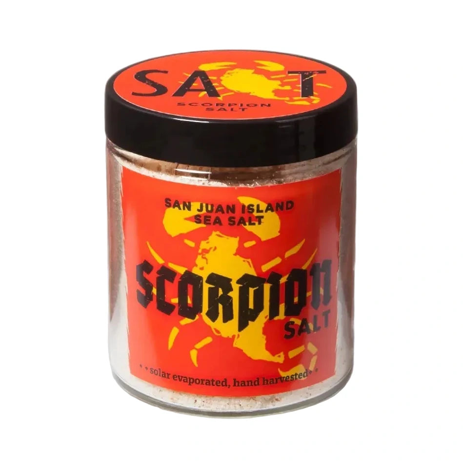 Jar of Scorpion Salt with red label and black lid on a white background