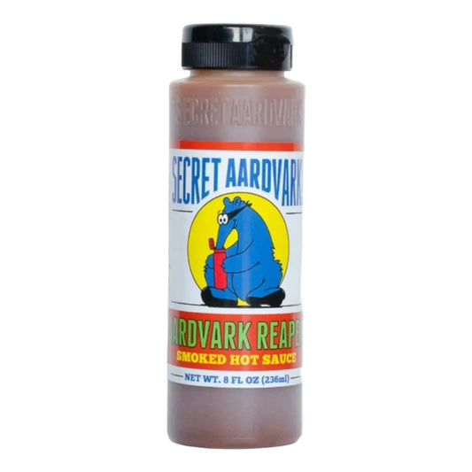 Bottle of Secret Aardvark Smoked Hot Sauce on a white background
