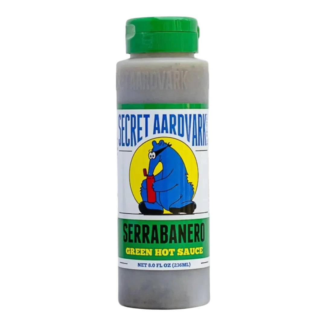 Secret Aardvark Serrabanero green hot sauce bottle on a white background