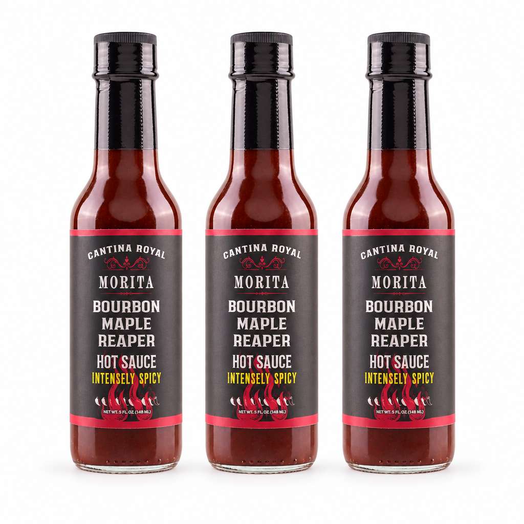Three bottles of Cantina Royal Bourbon Maple Reaper Hot Sauce