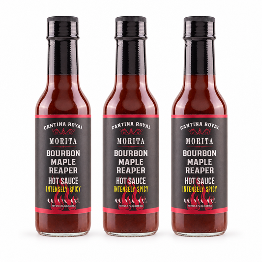 Three bottles of Cantina Royal Bourbon Maple Reaper Hot Sauce