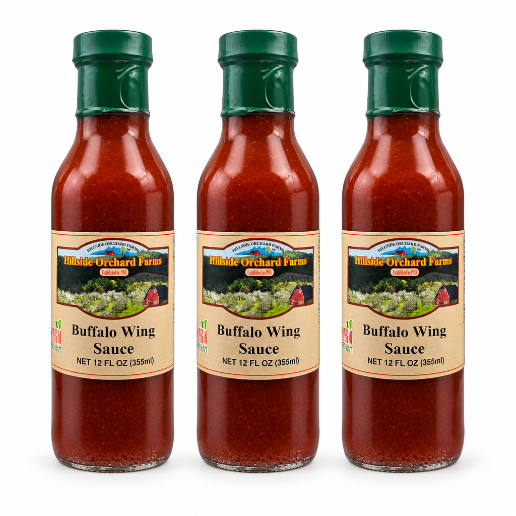 Three bottles of Hillside Orchard Farms Buffalo Wing Sauce