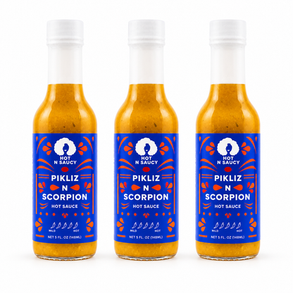 Three bottles of Hot N Saucy Pikliz N Scorpion-hot-sauce