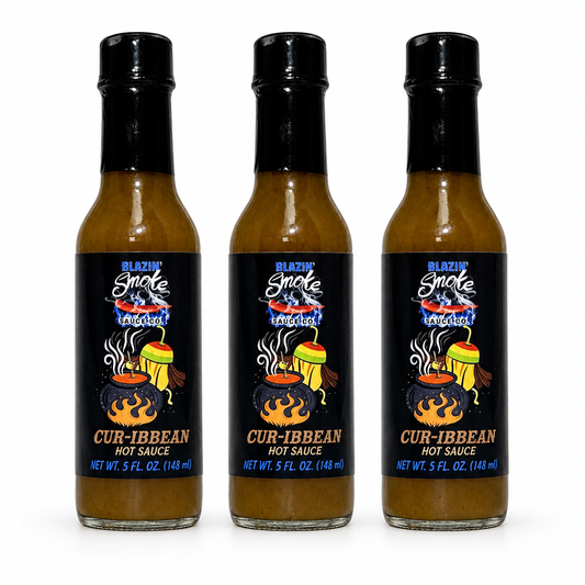 Three bottles of Rising Smoke Cur-ibbean Hot Sauce