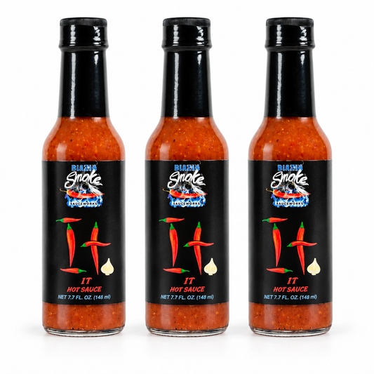 Three bottles of Rising Smoke It Cayenne Pepper Hot Sauce