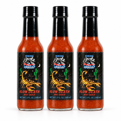 Three bottles of Rising Smoke Slow Death Scorpion Hot Sauce