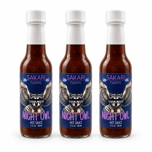 Three bottles of Sakari Farms Night Owl Hot Sauce
