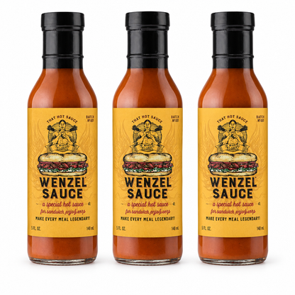 Three bottles of Wenzel Hot Sauce