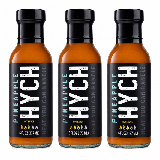 Three HYCH Pineapple bottles