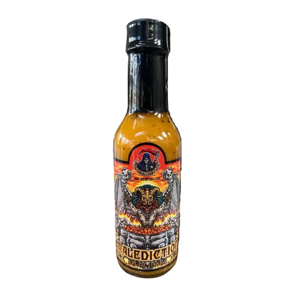 Unhallowed Mango Habanero hot sauce bottle with a colorful label on a white background