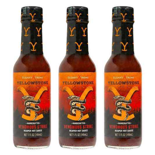 Three identical bottles of Elijah's Trace Handcrafted Venomous Strike Heated Hot Sauce arranged side by side on a plain white background.